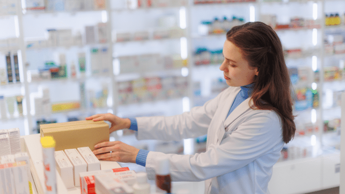 Medical professional checking the quality of products.