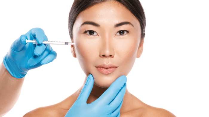 Woman getting Dermalax filler.