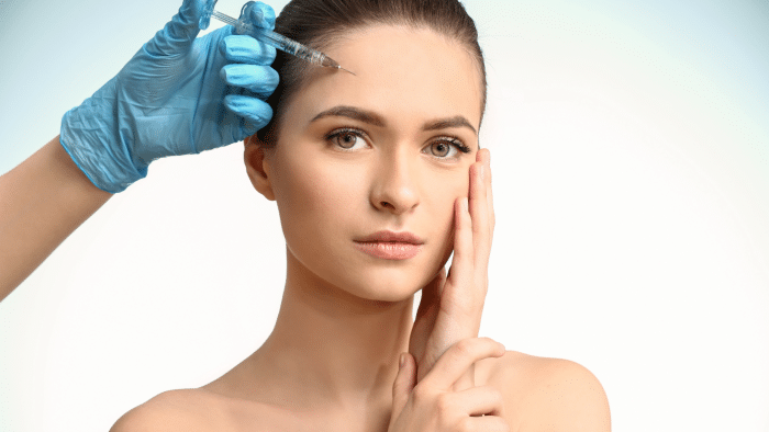 Woman receiving Hyacorp filler for the face.