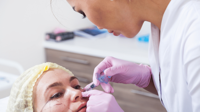 Healthcare professional expertly administering Botox injections.