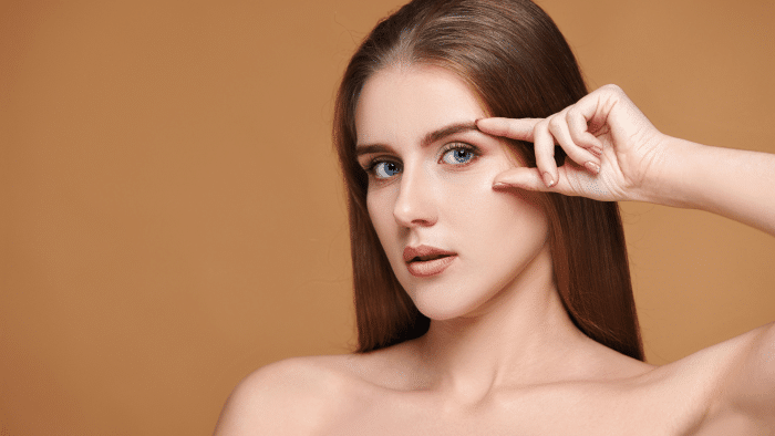 Woman with eye treatments.