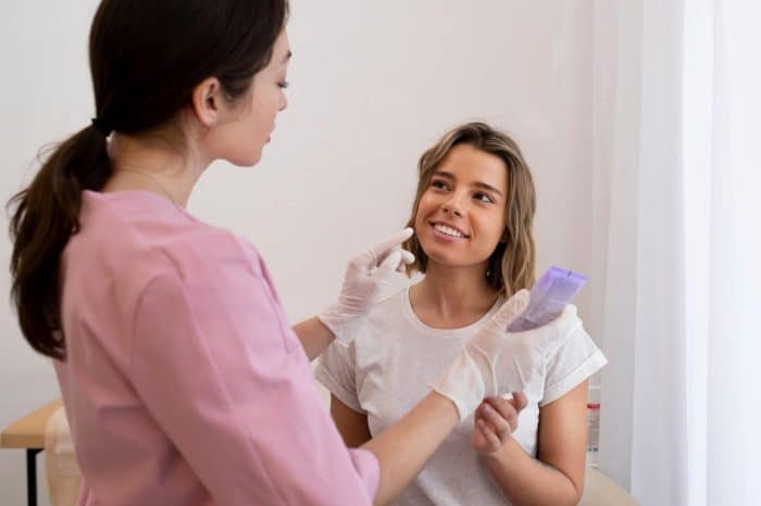 An aesthetic specialist carefully explains the side effects and what to expect after Dysport treatment.