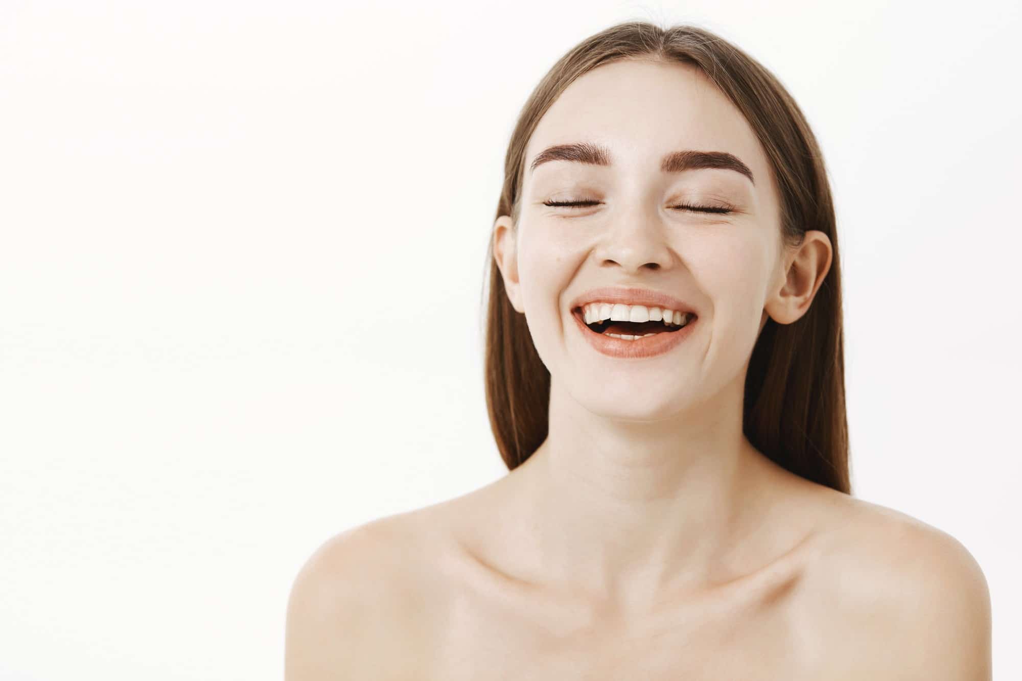 A woman feels confident and happy with her appearance after Dysport treatment.