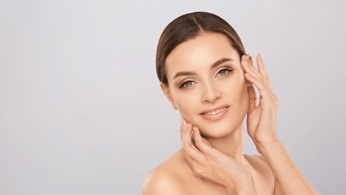 Woman getting facial treatment.