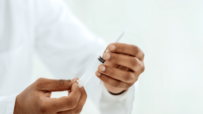 Doctor checking dosage.