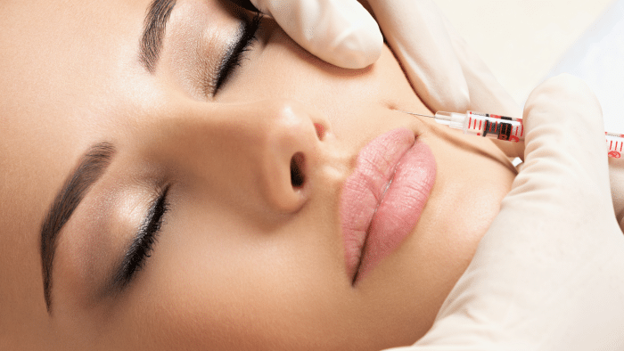 Woman getting injection.