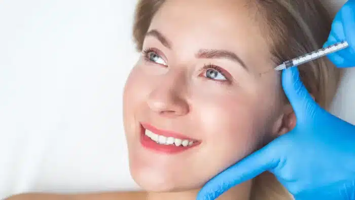 Woman getting a facial treatment.