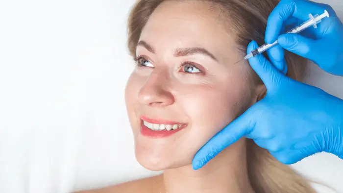 Woman getting injection.