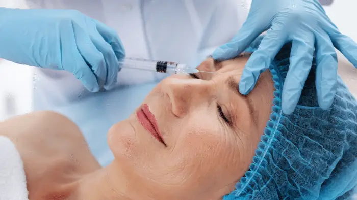 Woman getting injection.