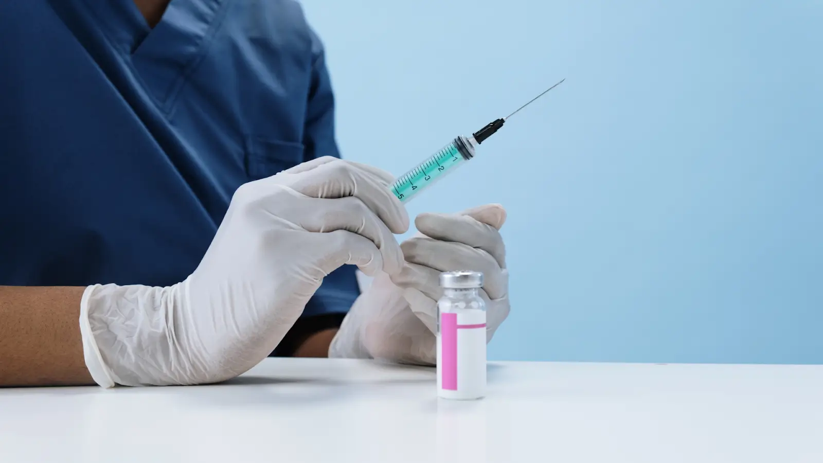 A healthcare professional prepares Sculptra injection before treatment.