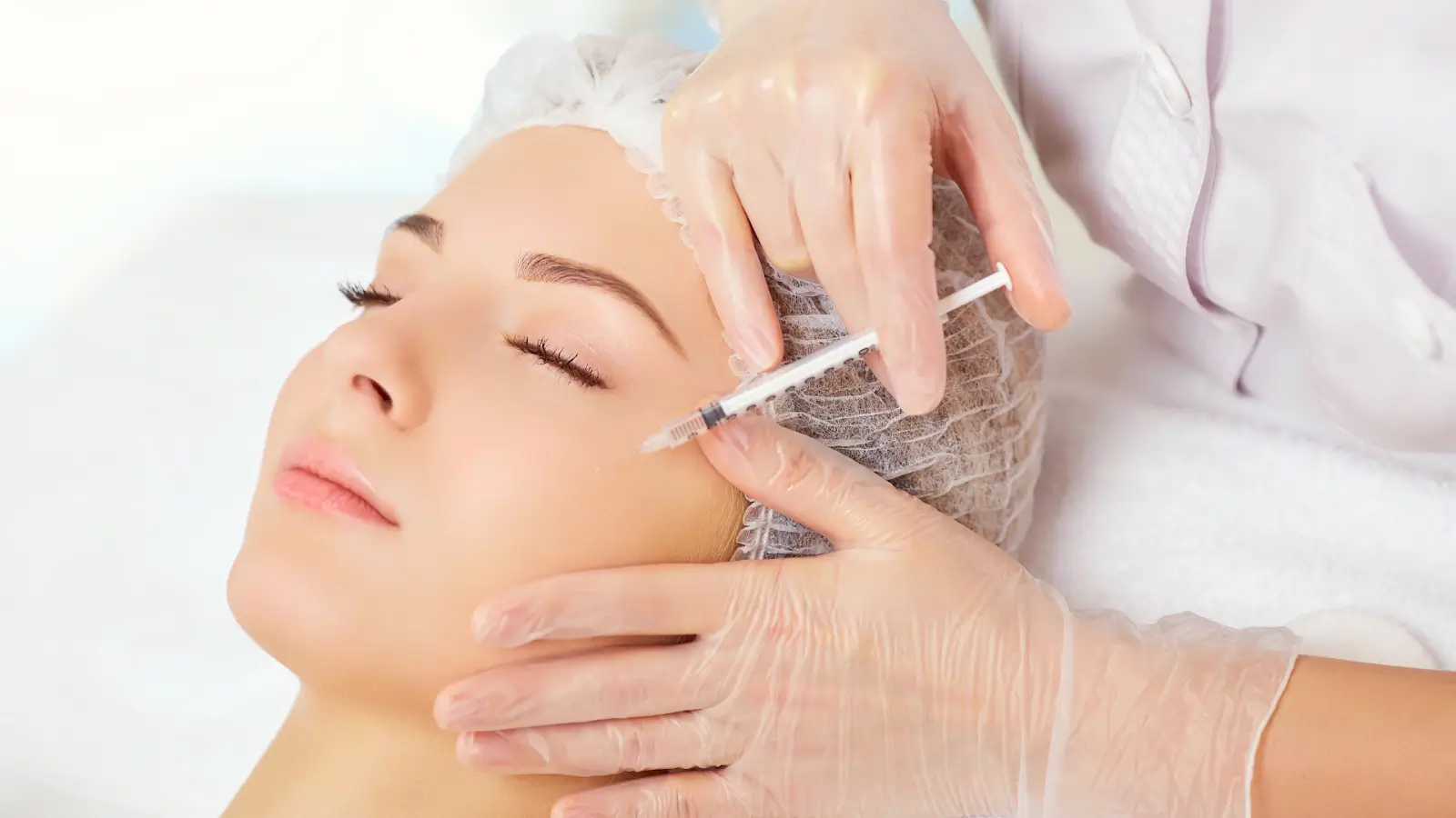 A female patient getting facial fillers.
