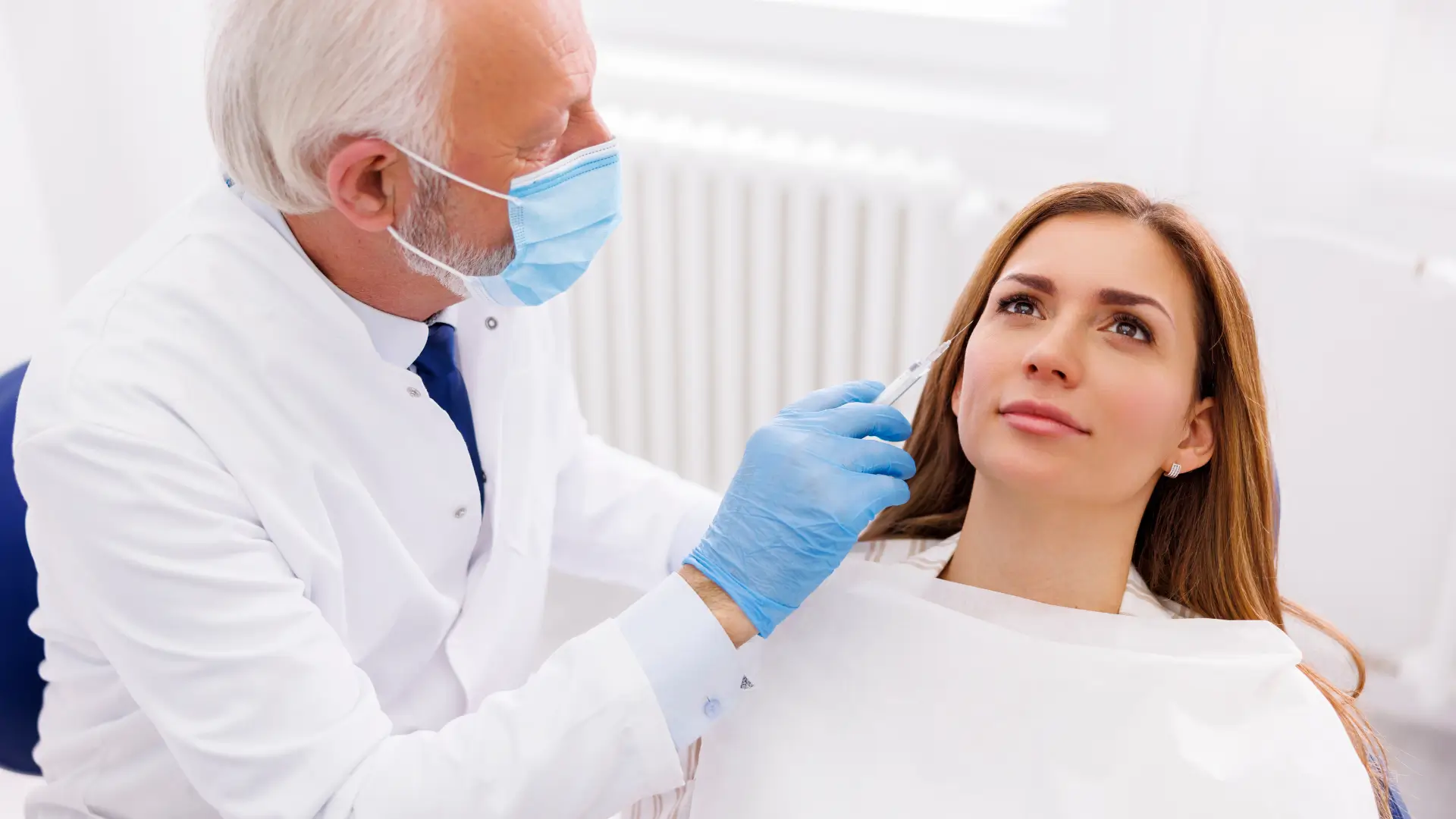 Doctor giving an injection. 