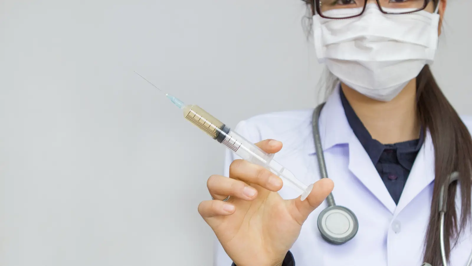 Woman with an injection.