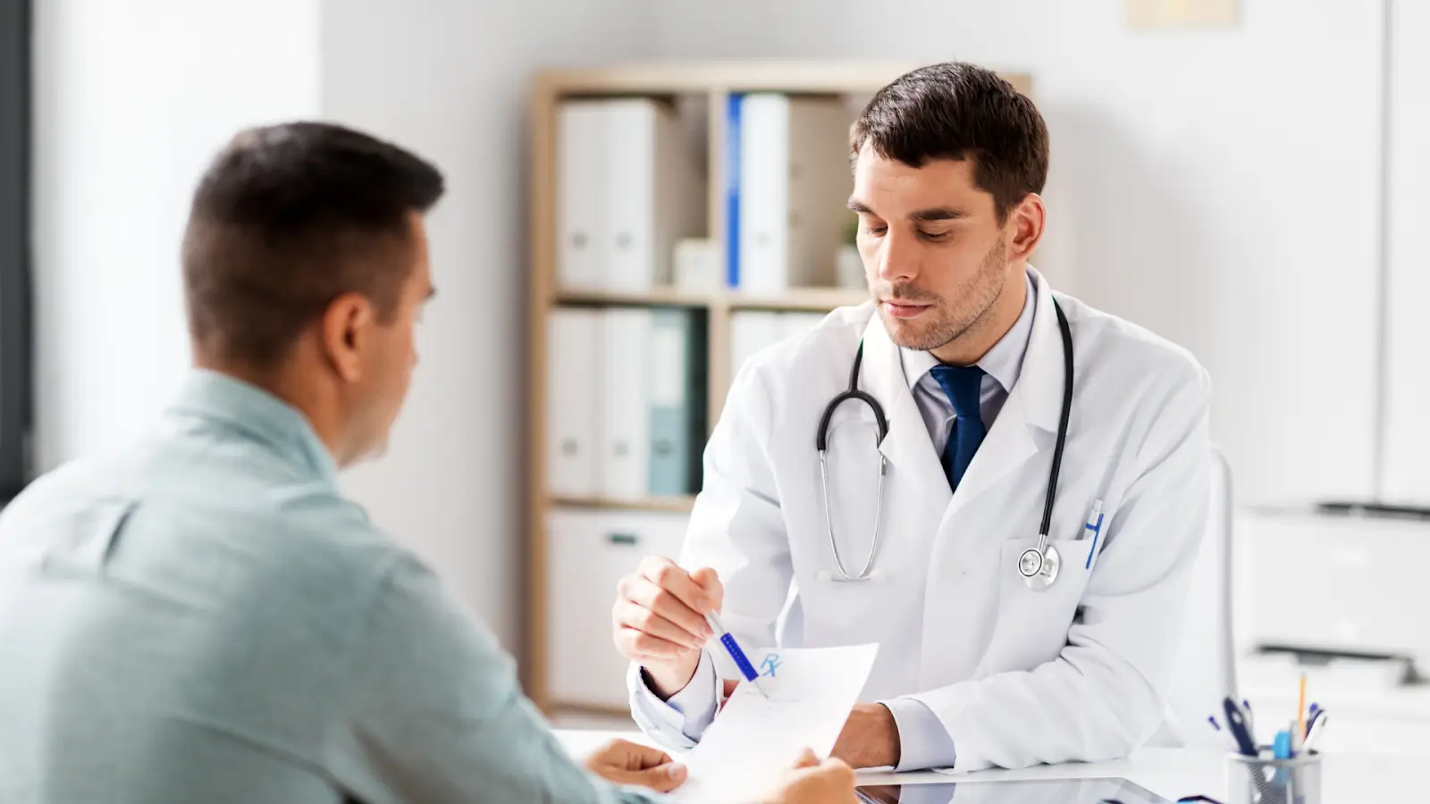 Doctor discussing risk management. 
