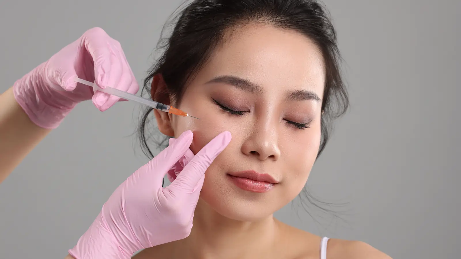 Woman getting an injection.