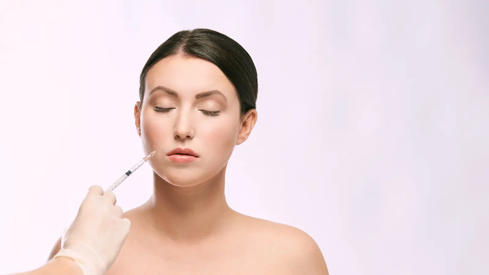 Woman getting an injection.