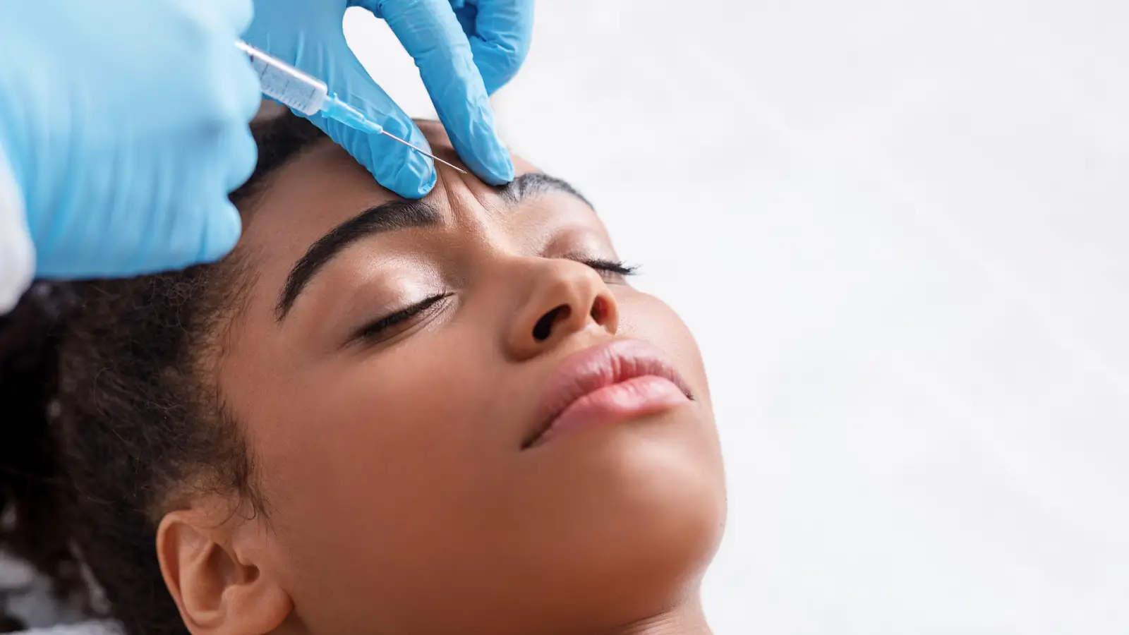 Forehead wrinkles treatment with injections.