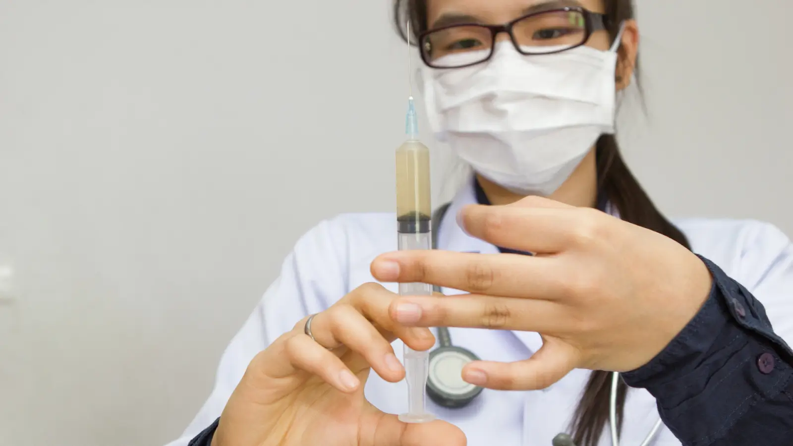 Woman with an injection.