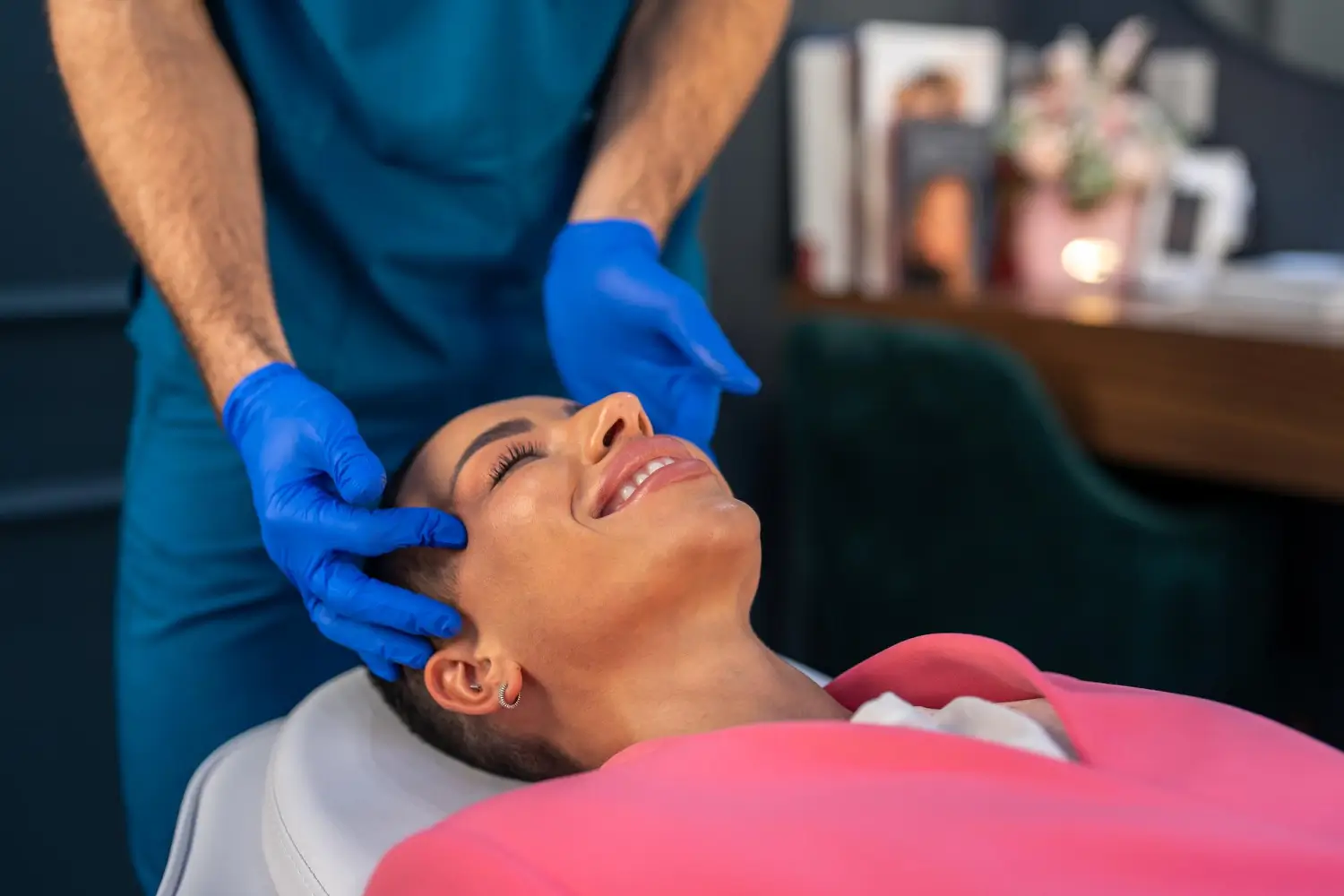 Woman getting facial treatment. 