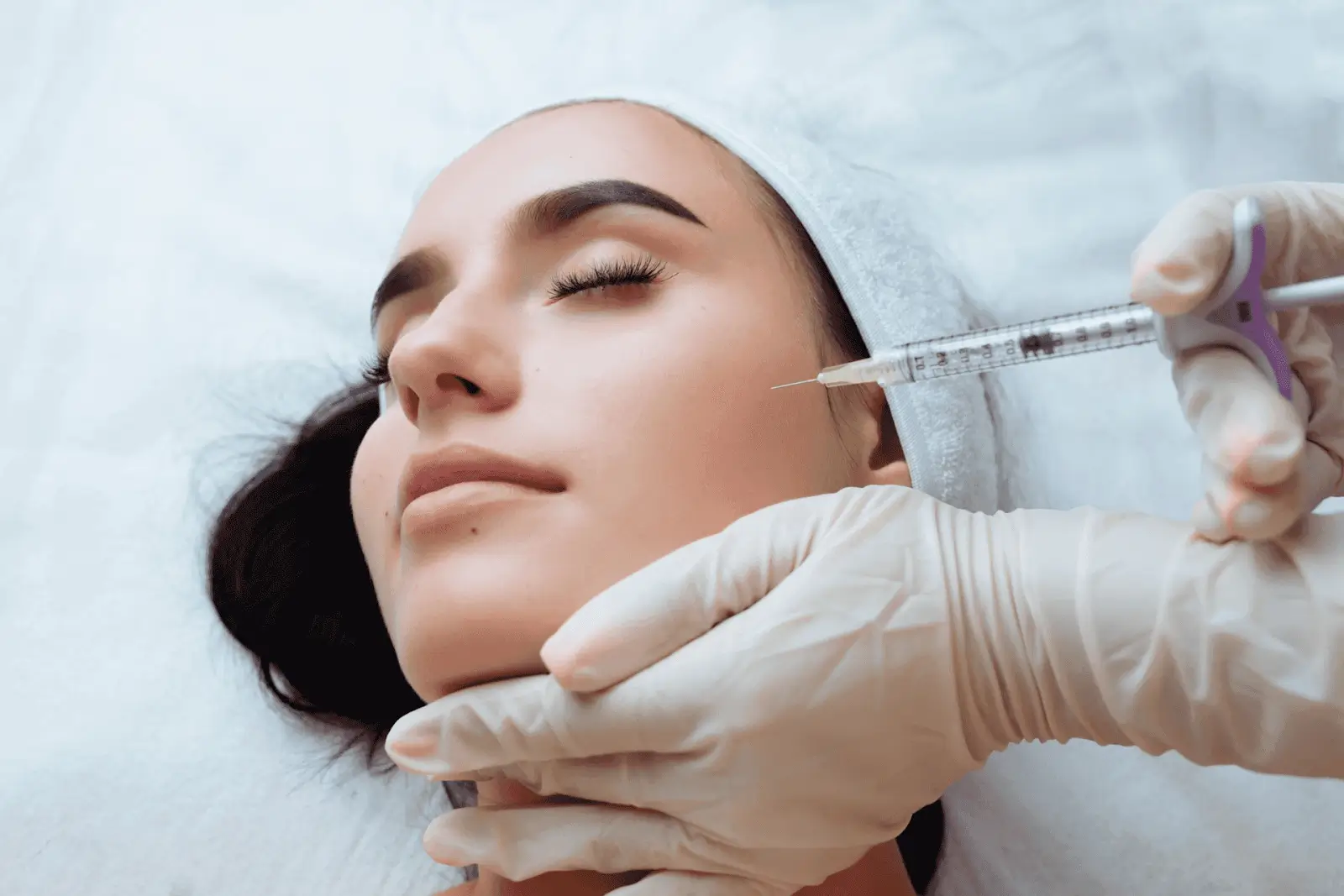 Woman getting an injection. 