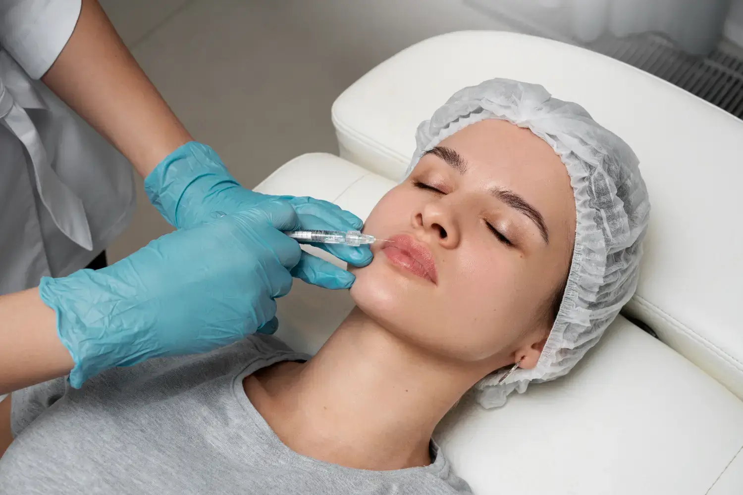 Lip injection on the woman.