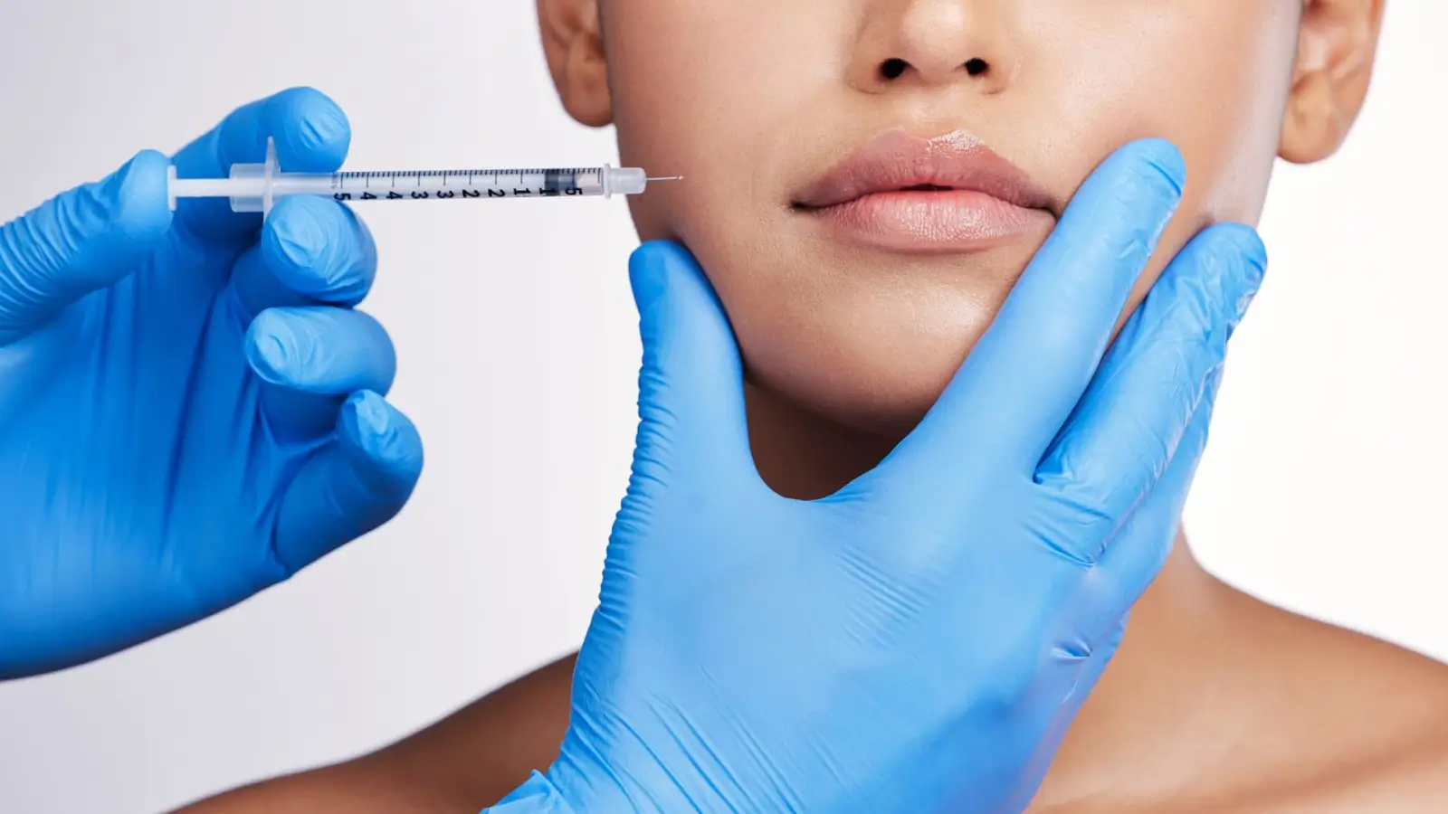 Face getting injection.