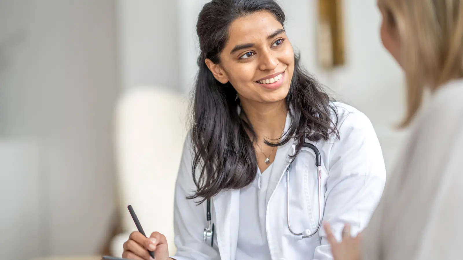 Doctor talking to patient.