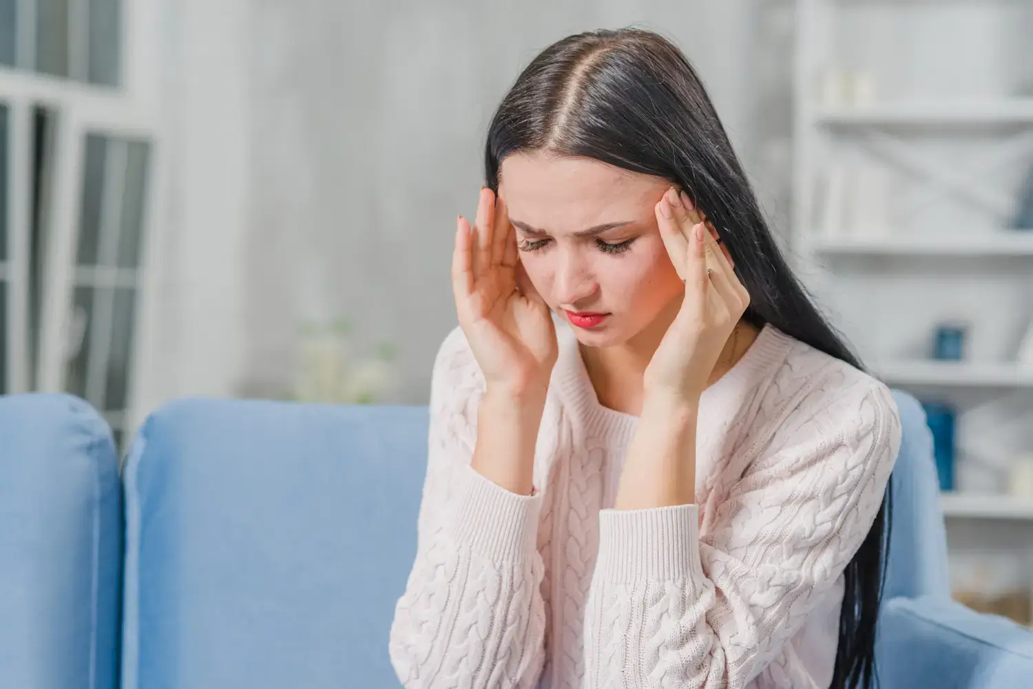 Person with a headache.
