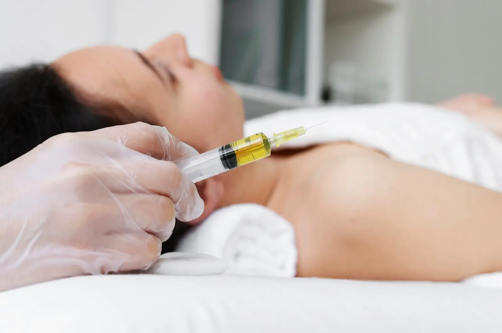 Person getting an injection.