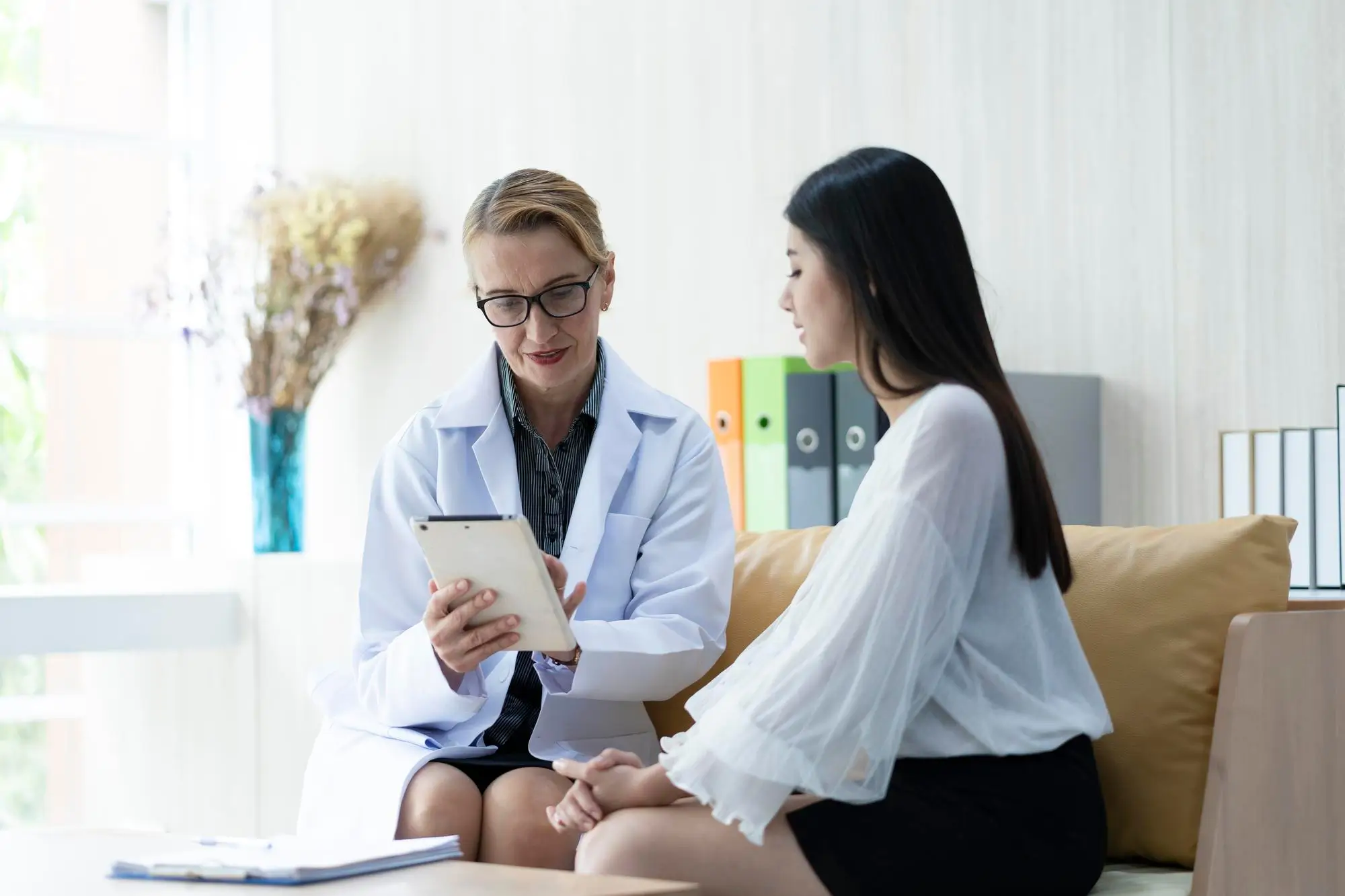 Doctor discussing treatment with patient.