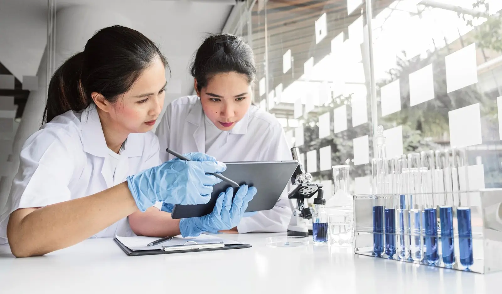 People looking at chemicals. 