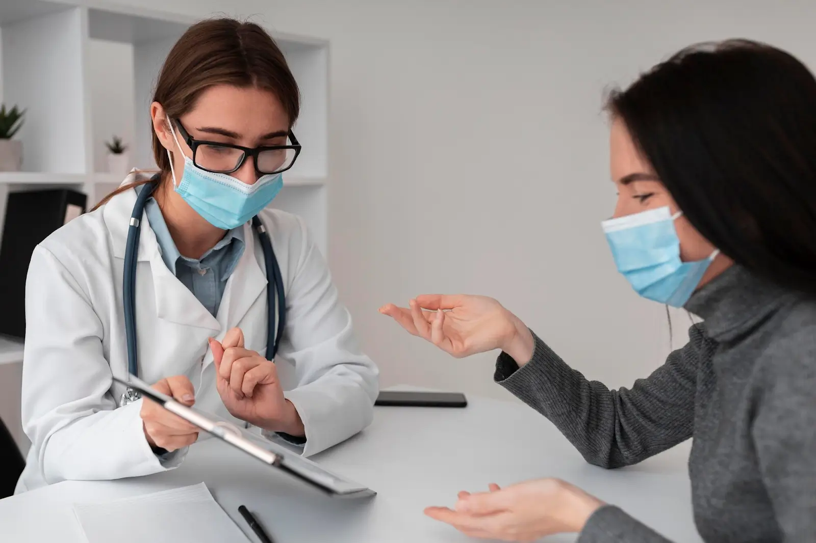 Patient discussing EMLA with doctor. 