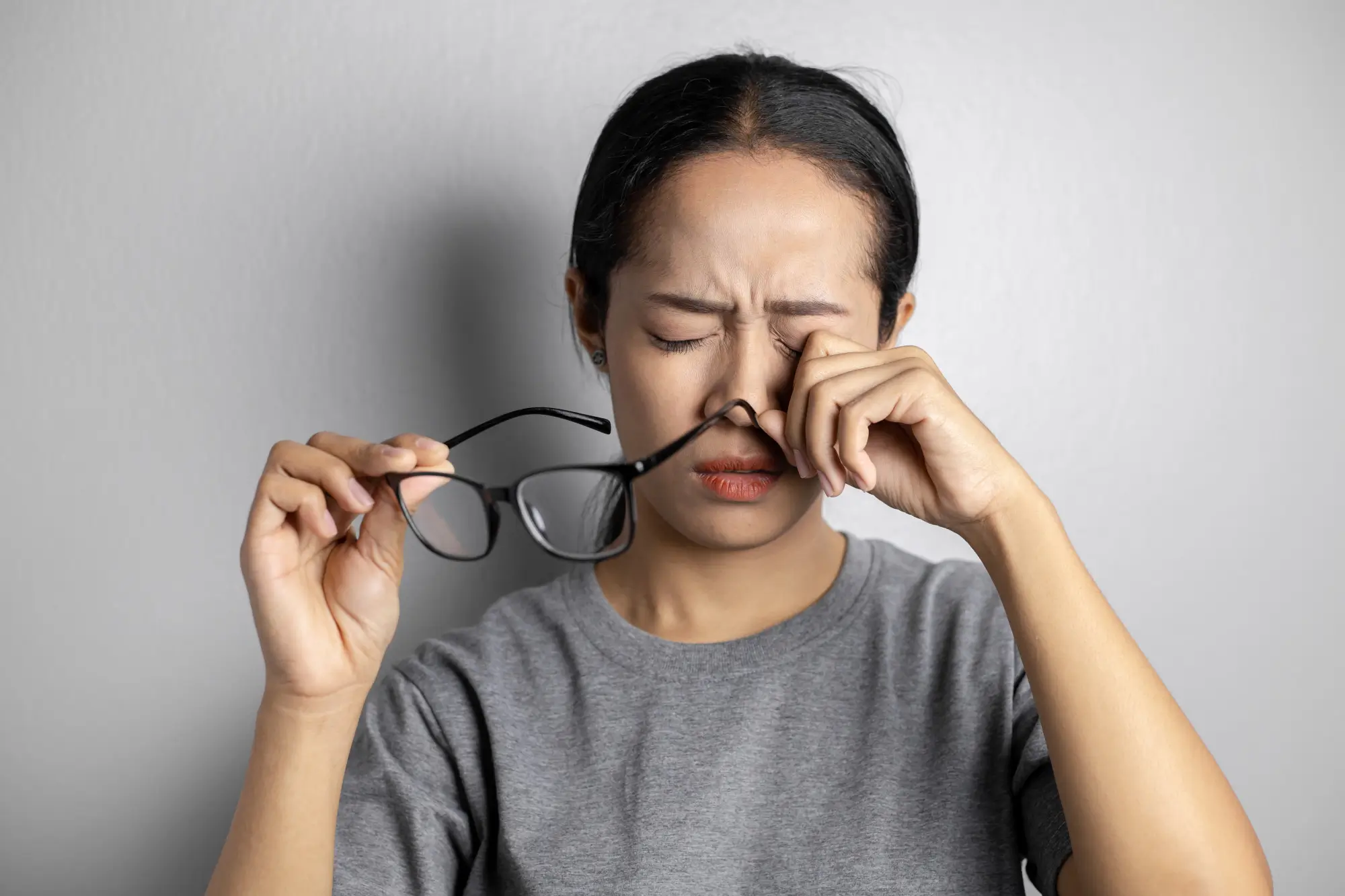Woman with irritated eyes.