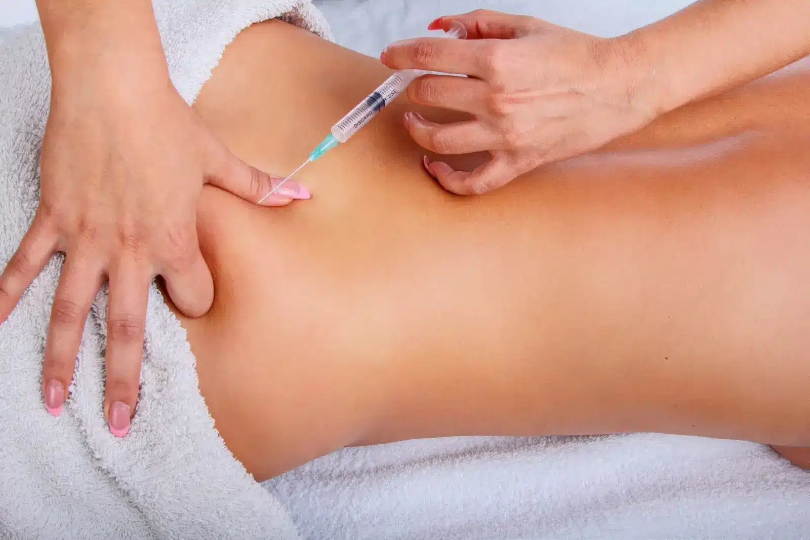 Person getting an injection.