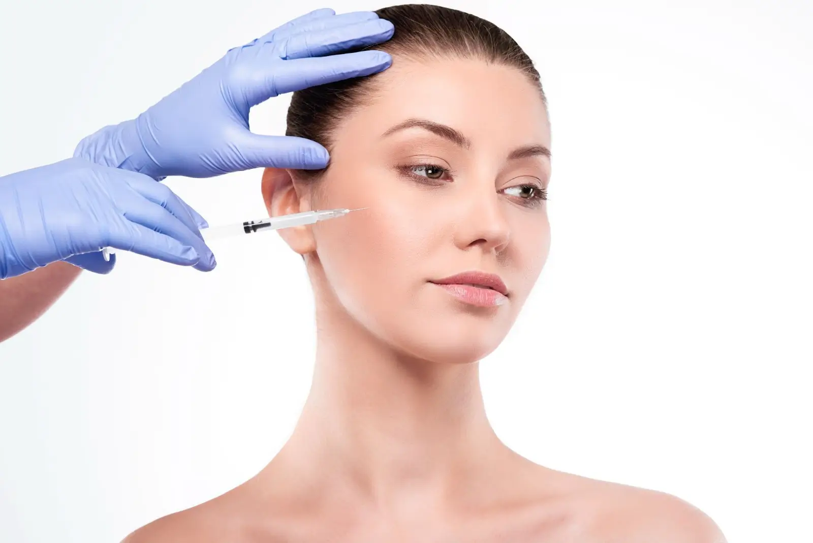 Person getting facial injection.