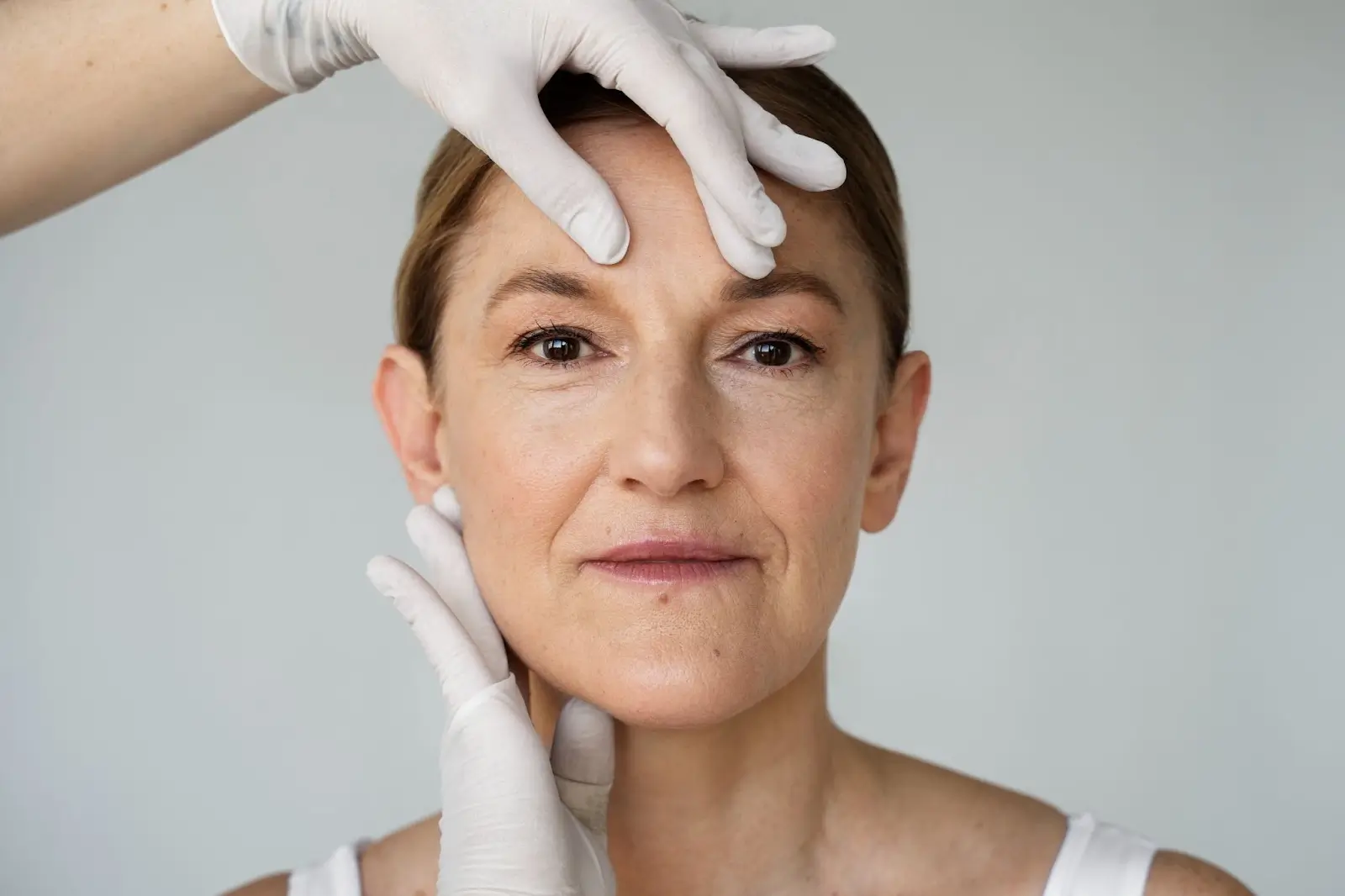 Person getting face assessment. 