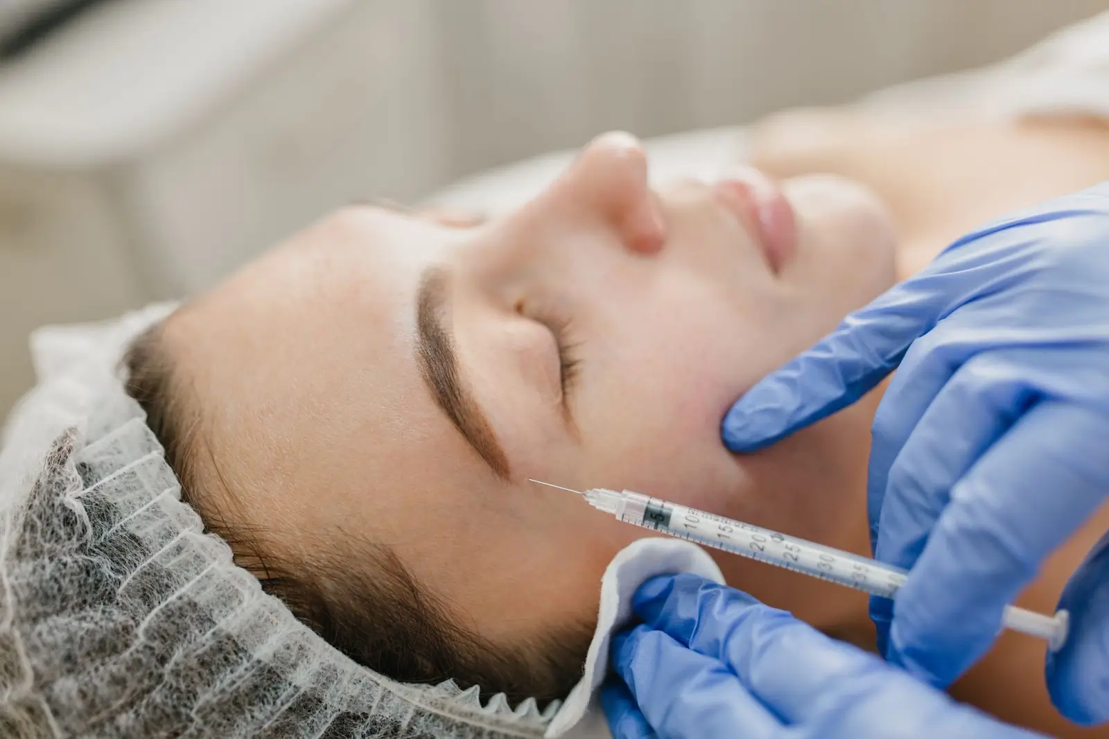 Person getting injected with the treatment.