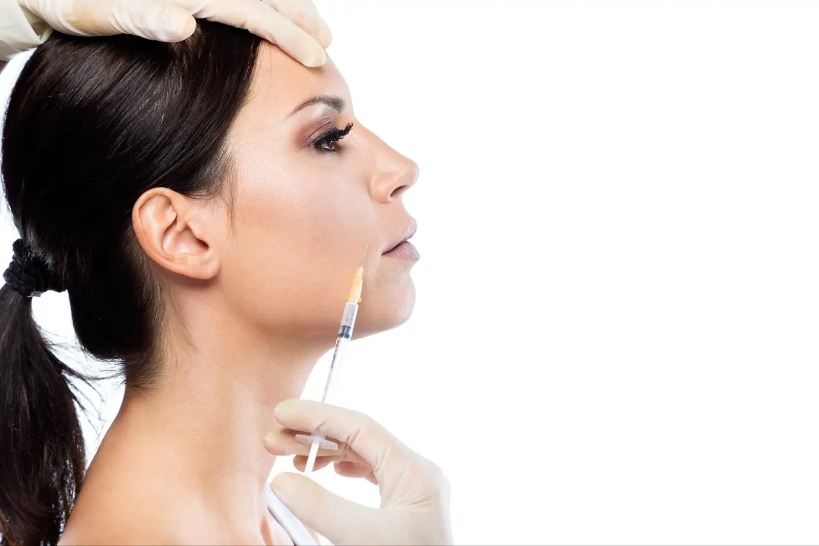 Person getting a facial injection. 
