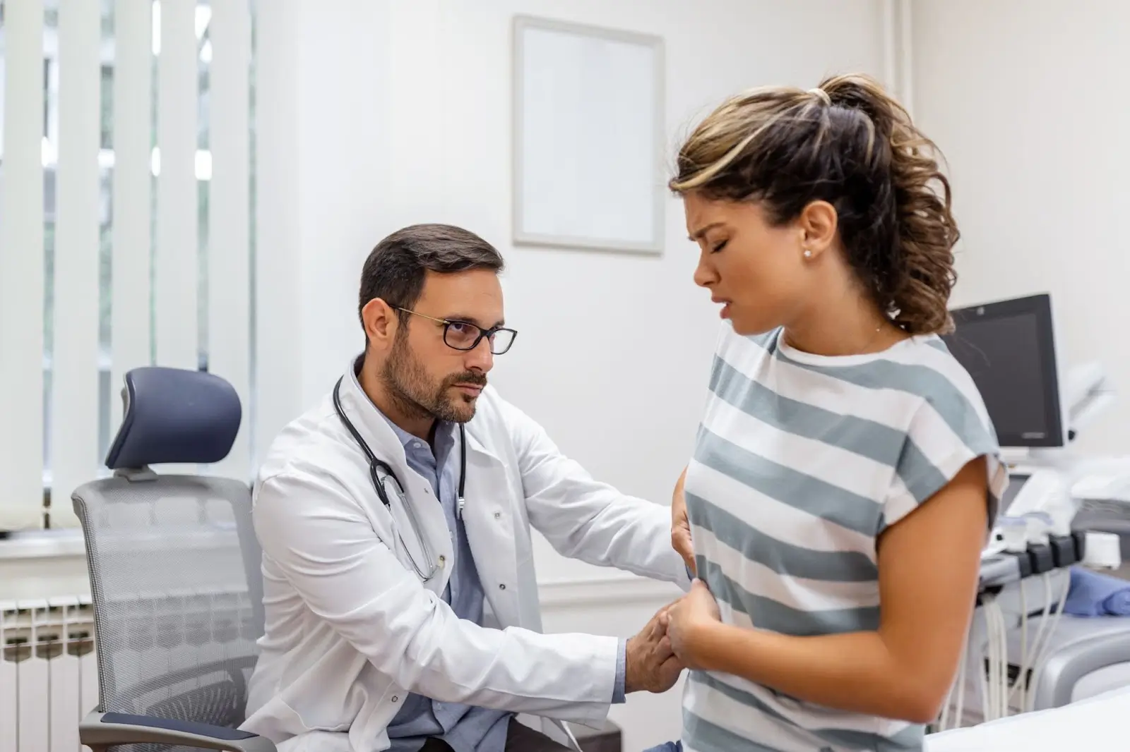 Doctor checking a patient.