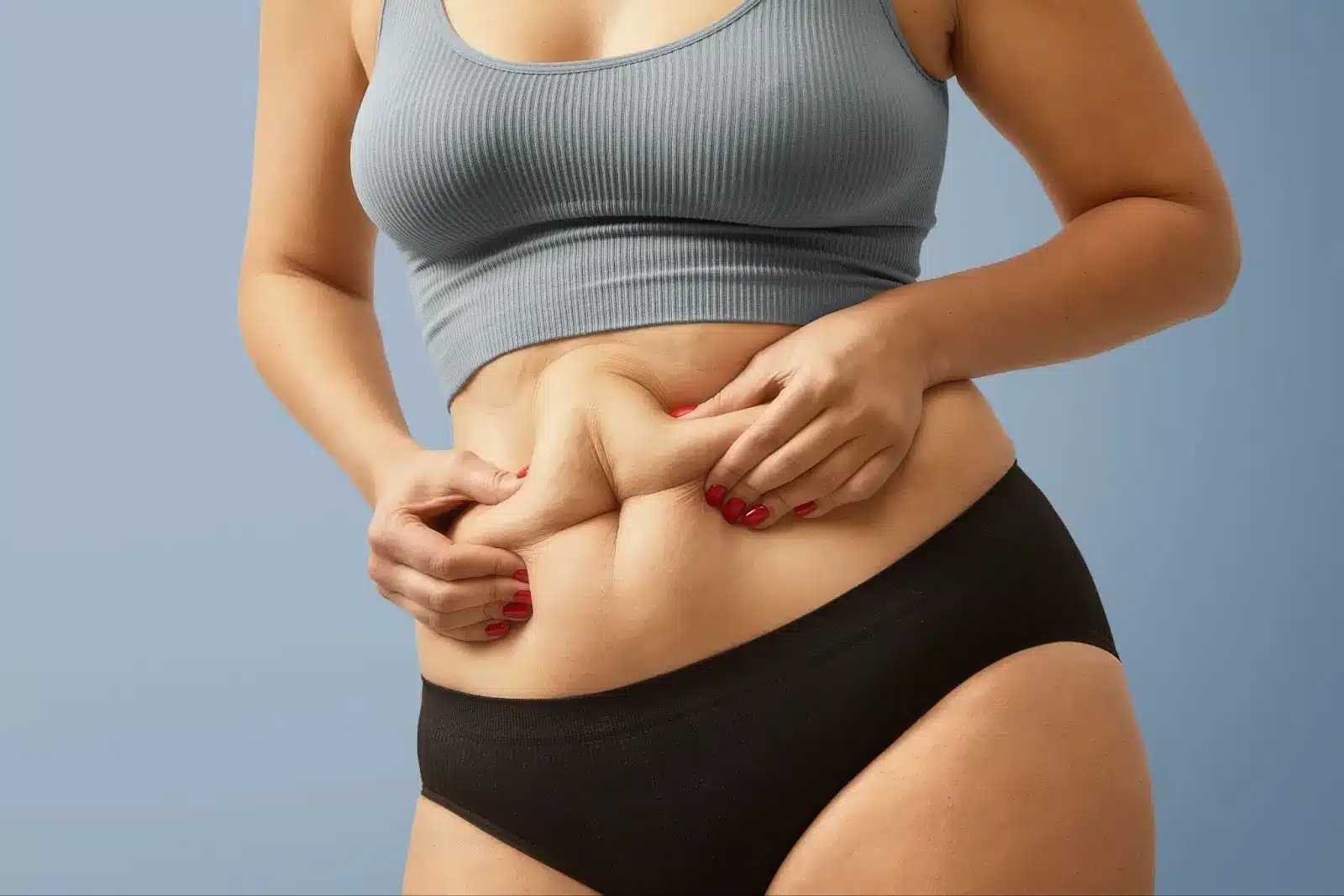 Person holding their stomach.