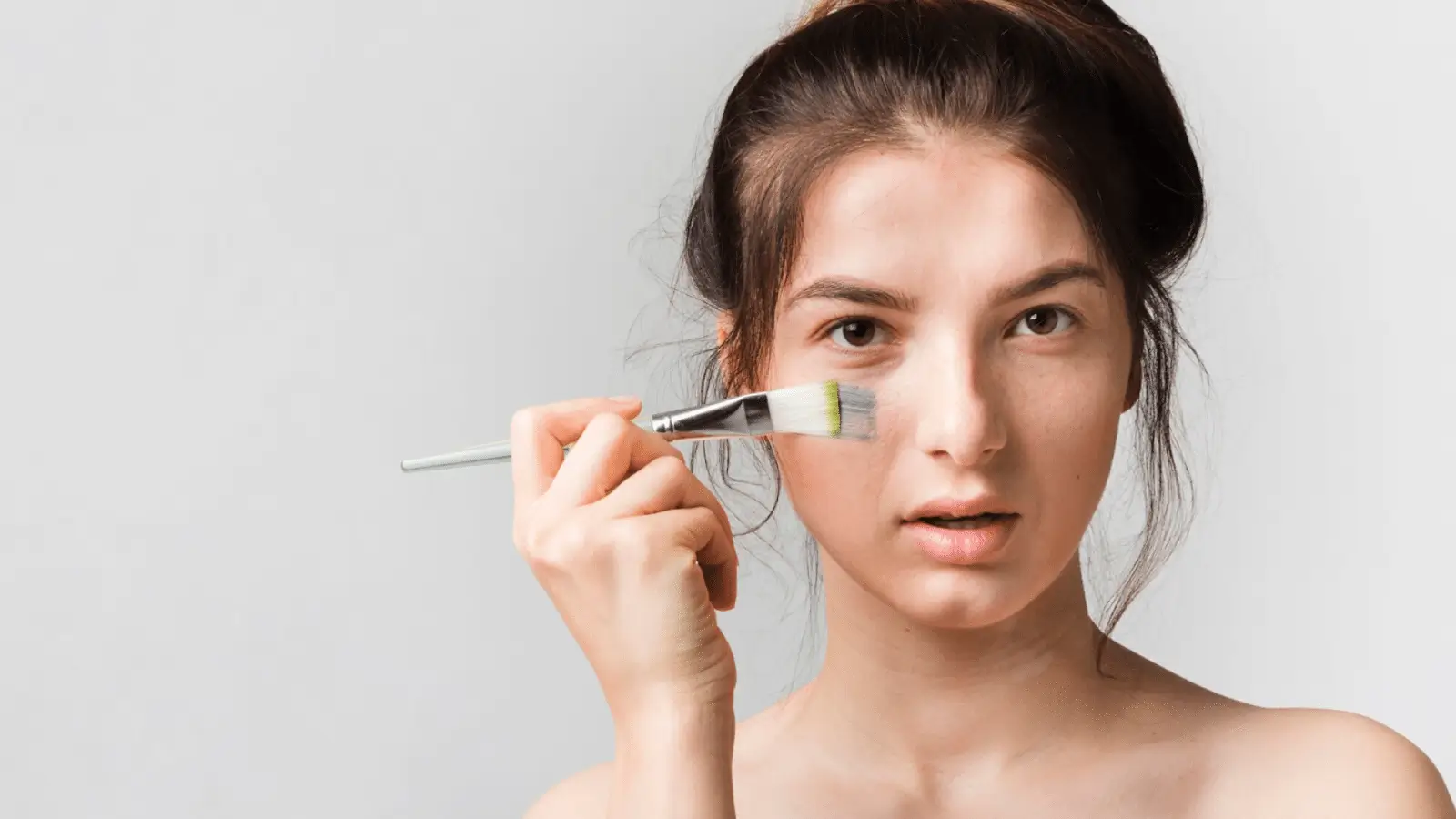 Person holding up an applicator for PRX-T33 treatments.