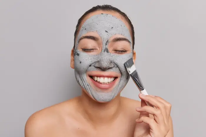 Person putting on PRX T33 on face.