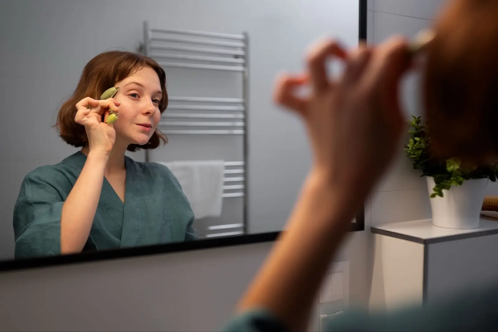 Person checking face after PRX-T33 treatment on face.