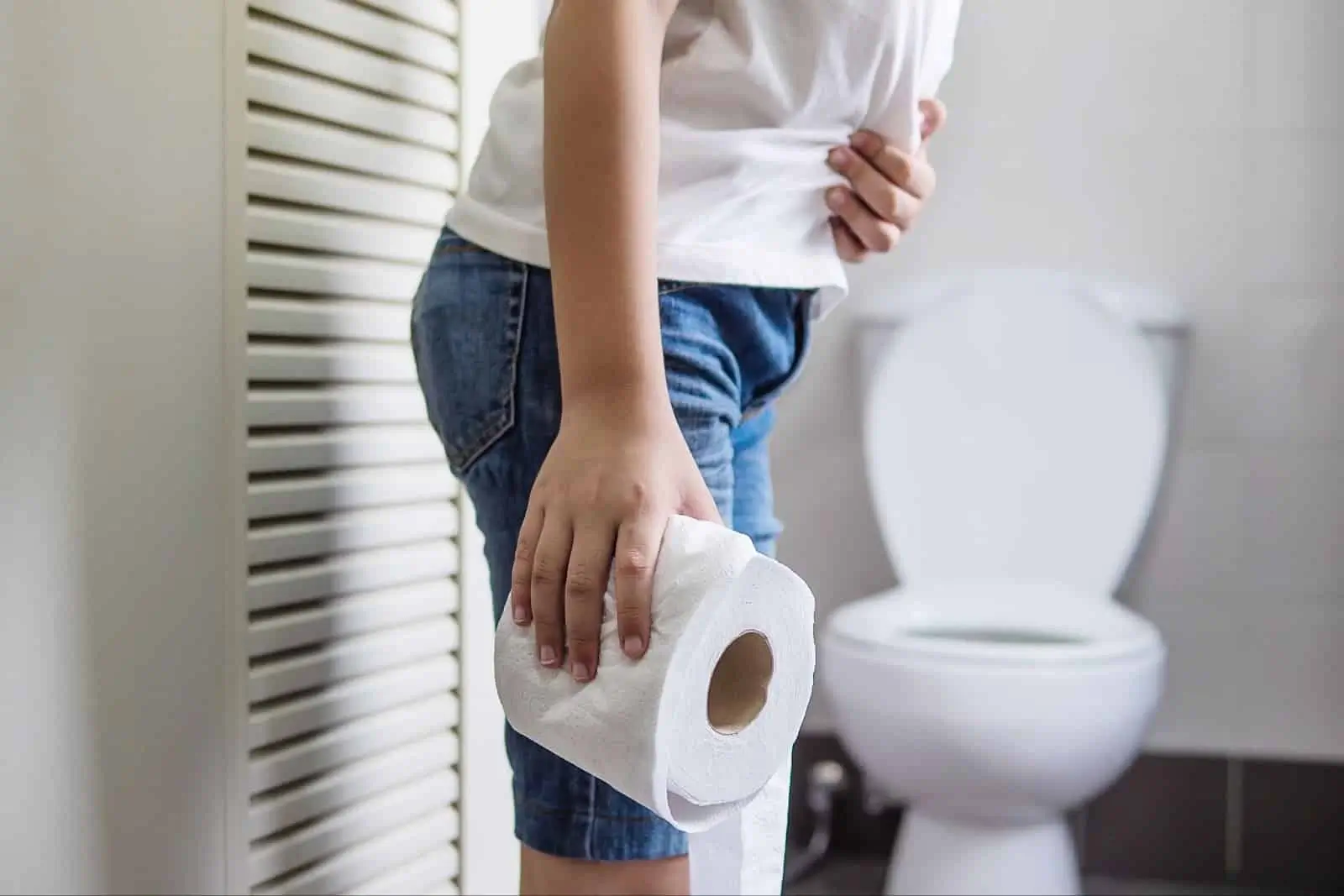 Person feeling stomachache after Entyvio treatment.